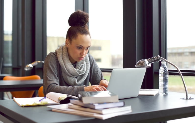 researcher at desk