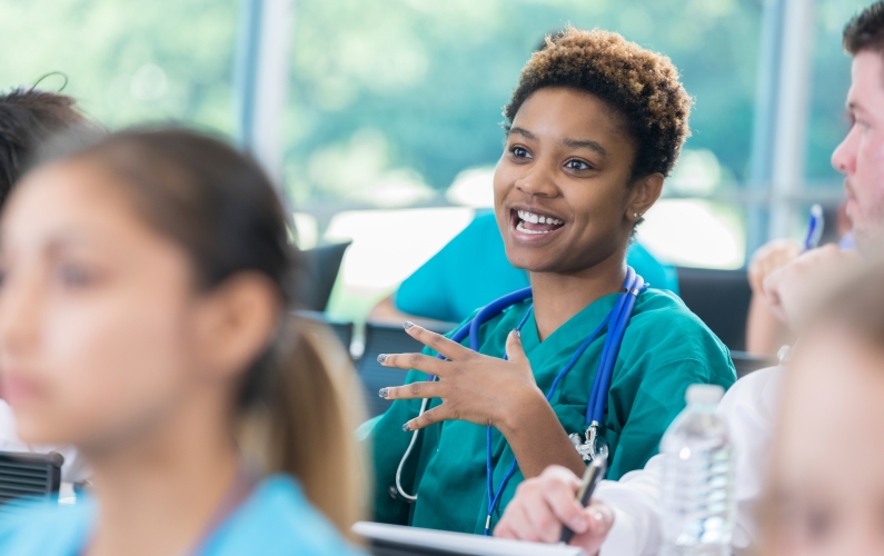 medical school student sitting in classroom