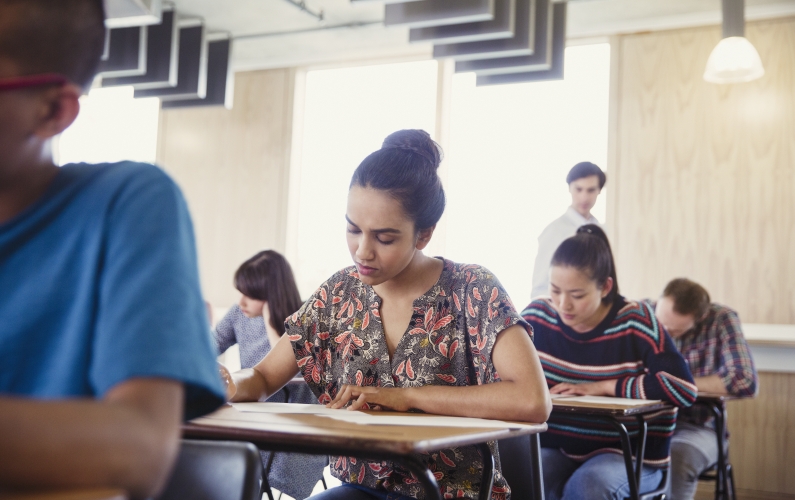 A photograph of students at desks