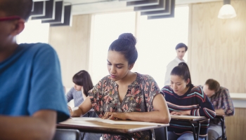 A photograph of students at desks