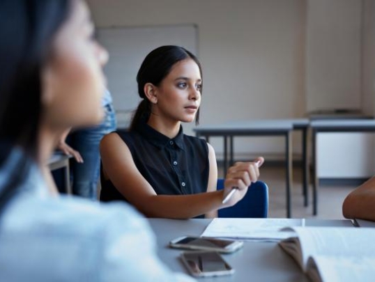 A photograph of a student in class